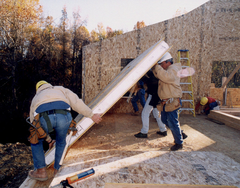 installing SIP panels timber frame home