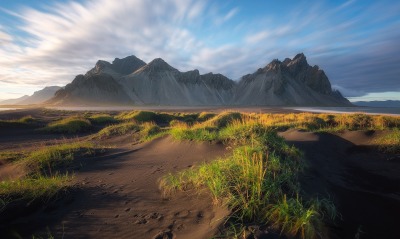 горы песок трава побережье